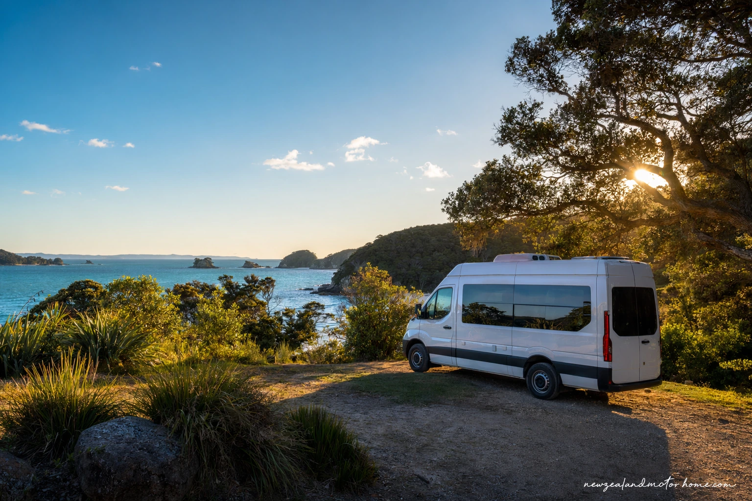 Campervan parked near golden beaches and native bush at Abel Tasman National Park