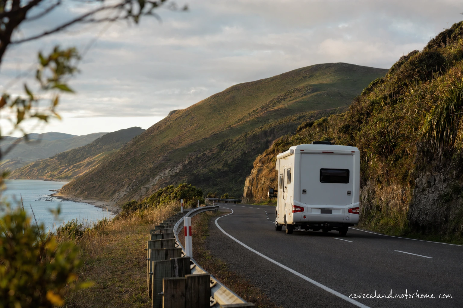Campervan parked near the Gisborne coastline after the long drive north from Dunedin