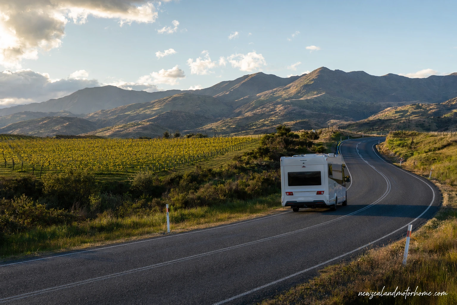 Campervan parked beside vineyards near Blenheim after the drive from Nelson