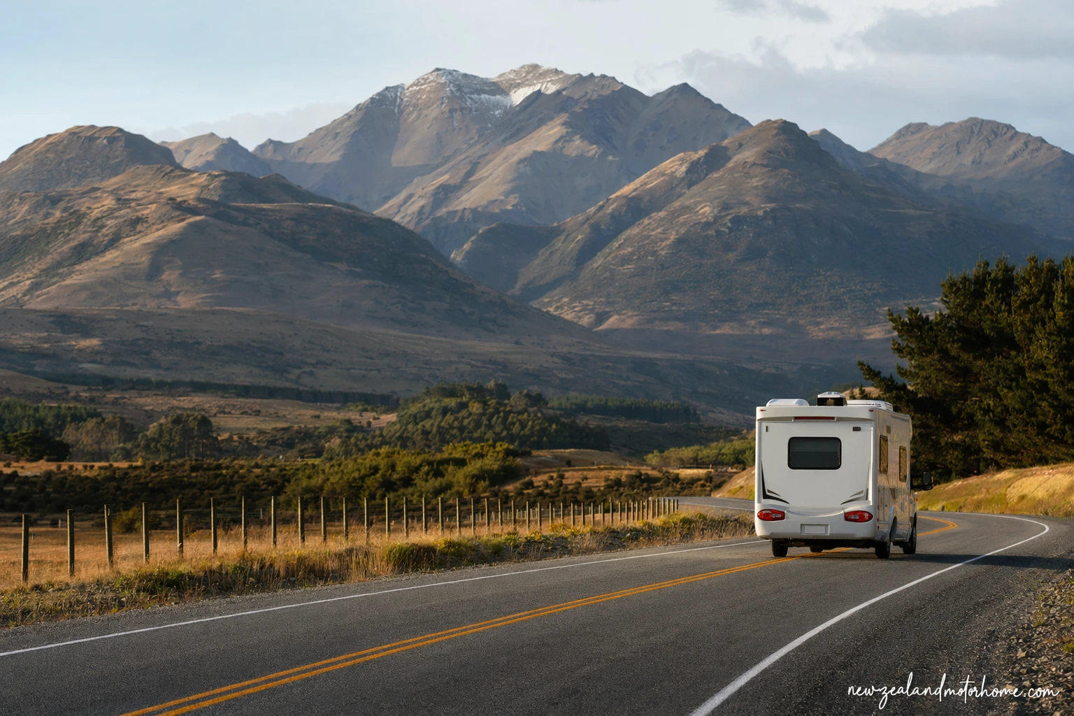 Campervan parked beside a South Island lake on the Nelson to Invercargill route