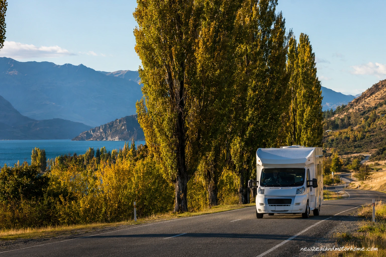 Campervan parked beside a Central Otago road on the Queenstown to Dunedin route