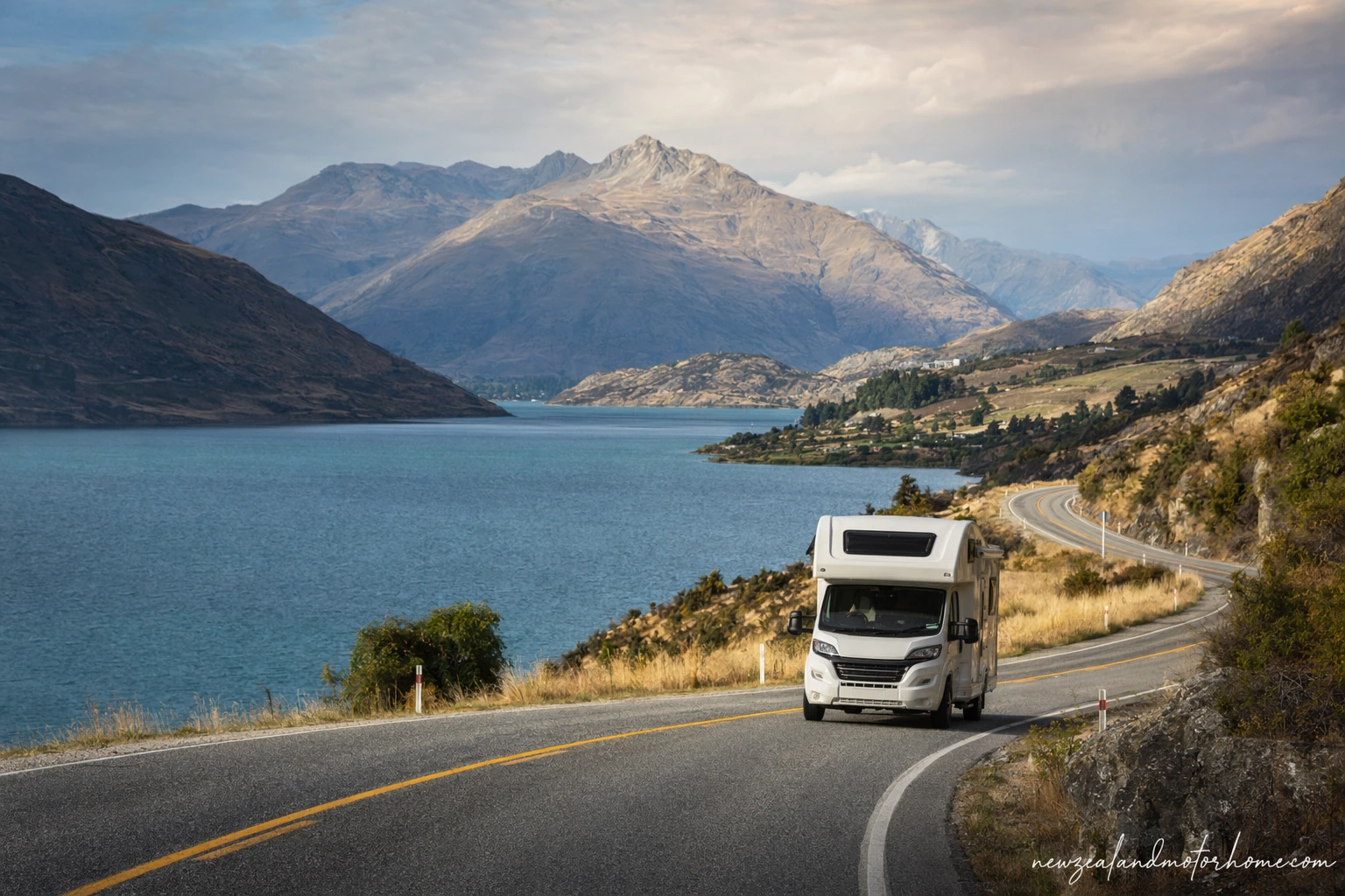 Campervan parked beside Lake Tekapo on the Queenstown to Hamilton route