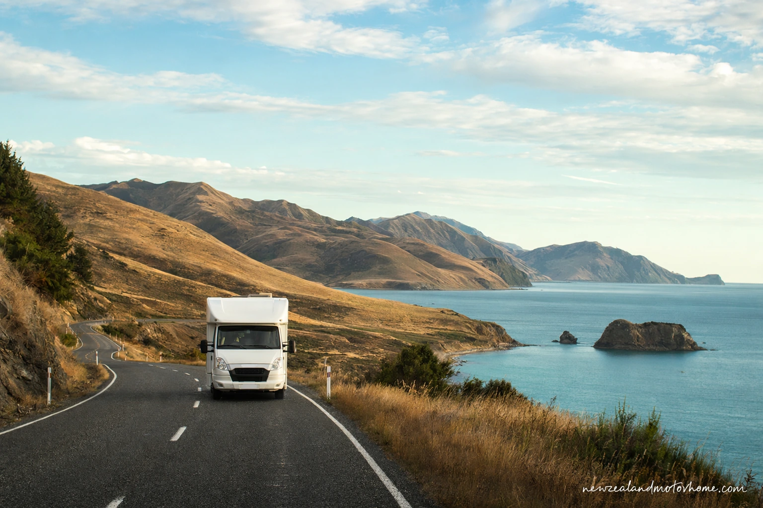 Campervan on the Rotorua to Napier road with forested hills and Hawke’s Bay countryside ahead